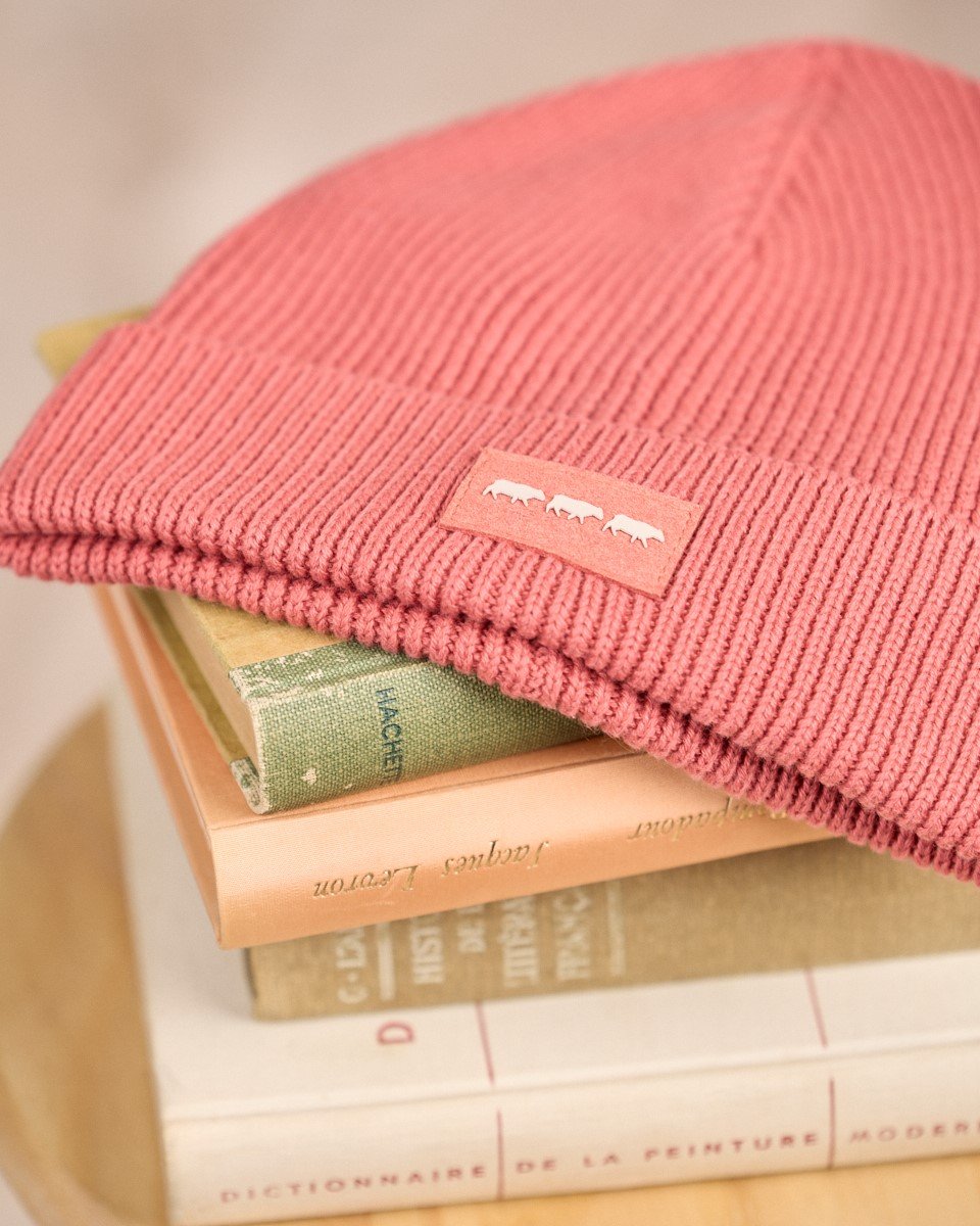 Bonnet en tricot rose