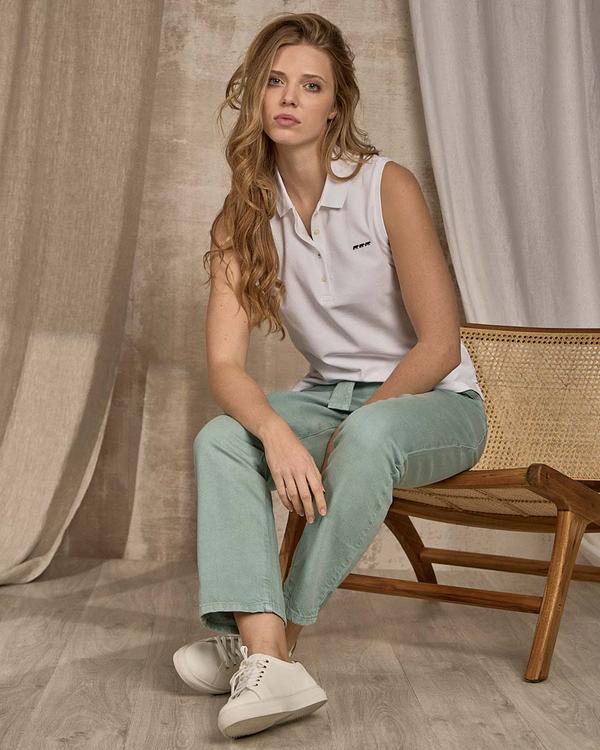 Polo sans manches blanc Polo sans manches blanc