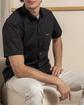 Chemise manches courtes unie coupe regular fit Chemise manches courtes unie coupe regular fit